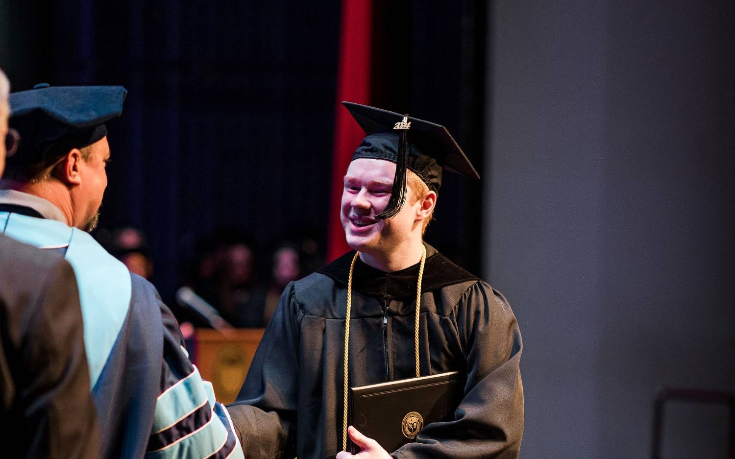 Graduate smiling