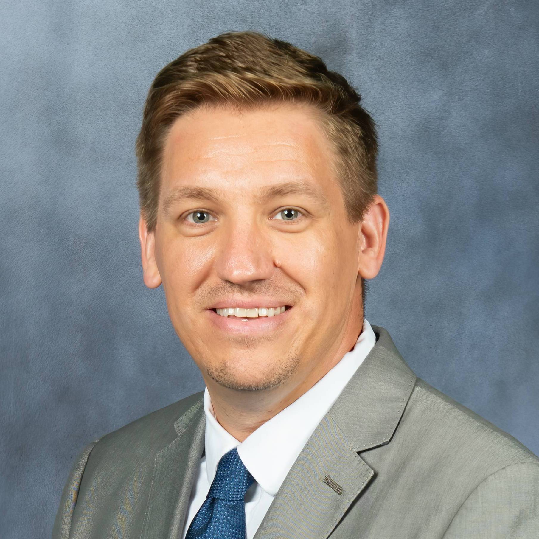 Man smiling for headshot photo