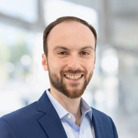 Headshot of man in suit