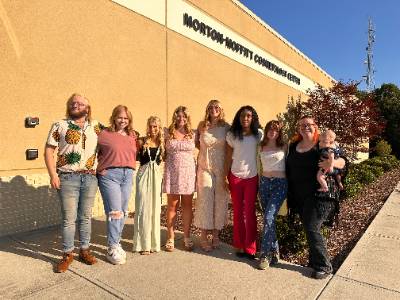 8 Students Standing Outside of Morton Moffitt Cosmetology Center