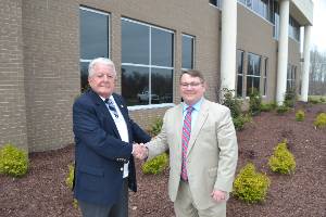 SCC President and Lane Brown Shaking Hands