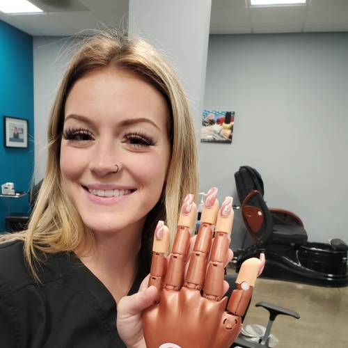 Student completing manicuring project in Cosmetology Club